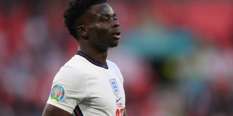 England's midfielder Bukayo Saka reacts during the UEFA EURO 2020 Group D football match between Czech Republic and England at Wembley Stadium in London on June 22, 2021. (Photo by Laurence Griffiths / POOL / AFP) (Photo by LAURENCE GRIFFITHS/POOL/AFP via Getty Images)