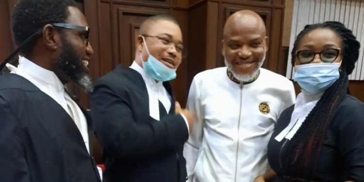 Nnamdi Kanu flanked by his legal team