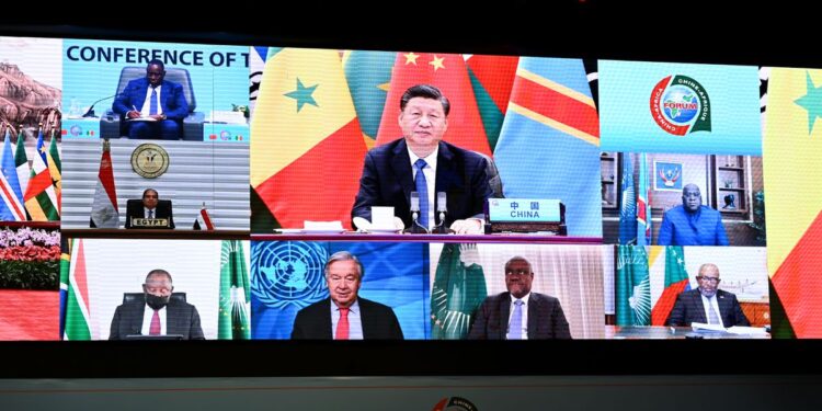 China's President Xi Jinping, Senegal's President Macky Sall, Congo's President Felix Antoine Tshisekedi, Egypt's President Abdel Fattah al-Sisi, South Africa's President Cyril Ramaphosa, United Nations (UN) Secretary General Antonio Guterres, Chairman of the African Union Commission Moussa Faki Mahamat and Comoros’ President Azali Assoumani attend the opening of the forum Forum on China-Africa Cooperation, (FOCAC) via video link in Dakar, Senegal November 29, 2021.