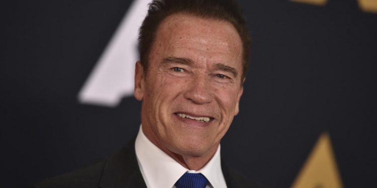 FILE - In this Nov. 12, 2016 file photo, Arnold Schwarzenegger arrives at the 2016 Governors Awards in Los Angeles. Schwarzenegger tells Men's Journal for an article published online on March 2, 2017, that he doesn't dwell on the affair that cost him his marriage to Maria Shriver and is focused on having a great relationship with his kids. (Photo by Jordan Strauss/Invision/AP, File)