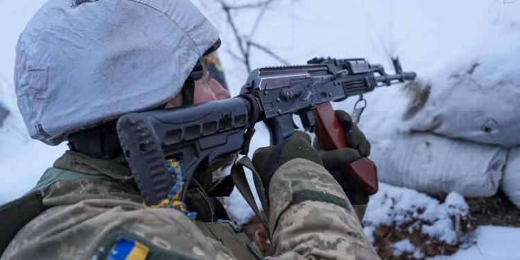 A Ukrainian soldier is seen along the front line as Ukraine's forces battle Russian-backed separatists, near the town of Zolote-4, in eastern Ukraine, January 19, 2022.