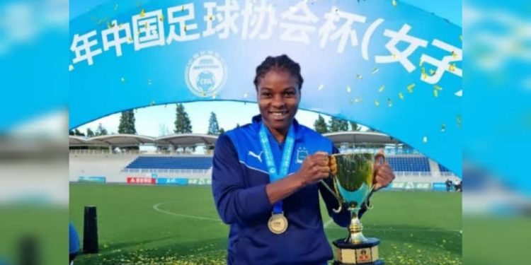 Desire Oparanozie with Chinese league title