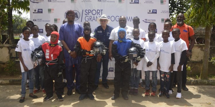 ATCN officials and young athletes pose for group photograph