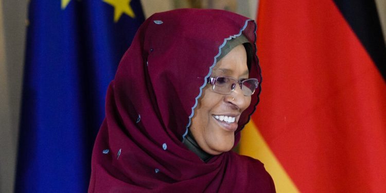 epa07705953 German Chancellor Angela Merkel (L) welcomes with Ambassador of Republic of Chad to Germany Mariam Ali Moussa (L) during a reception for members of the Diplomatic Corps in the guesthouse of the Federal Government near in Meseberg near Berlin, Germany, 09 July 2019. The annual traditional reception of the Diplomatic Corps event includes ambassadors of the states accredited in Germany as well as heads of international organizations.  EPA-EFE/JENS SCHLUETER