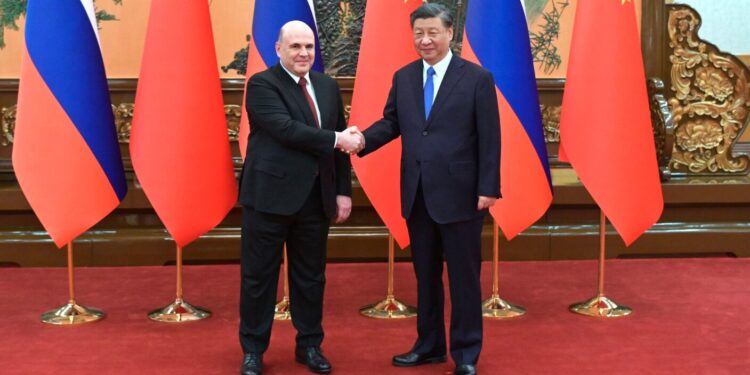 russia china seal economic pacts despite western disapproval