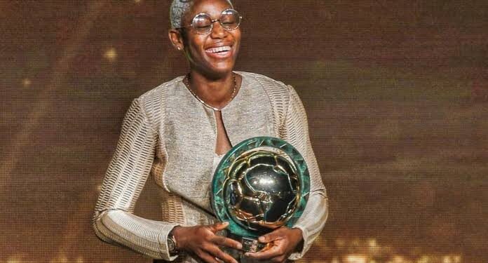 Asisat Oshoala after winning 2022 version the award