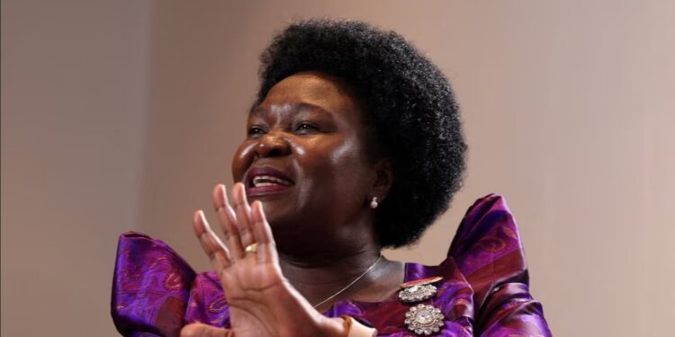 Ugandan Minister of Energy and Mineral Development Ruth Nankabirwa Ssentamu gestures during an Interview at the African Energy Week in Cape Town, South Africa, October 17, 2023.