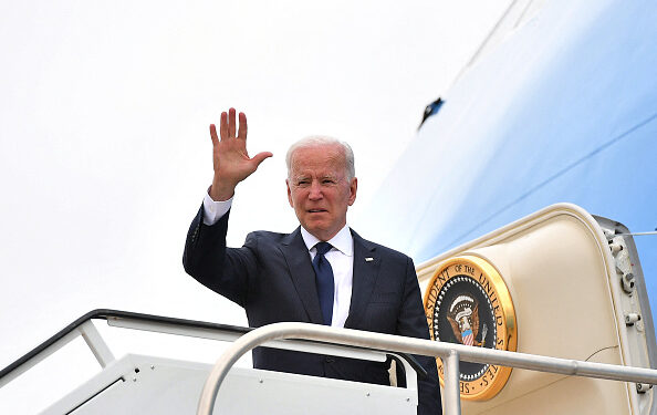 US President Joe Biden boards Air Force One before departing from Tulsa International Airport in Tulsa, Oklahoma, on June 1, 2021. - US President Joe Biden traveled Tuesday to Oklahoma to honor the victims of a 1921 racial massacre in the city of Tulsa, where African American residents are hoping he will hear their call for financial reparations 100 years on. (Photo by MANDEL NGAN / AFP) (Photo by MANDEL NGAN/AFP via Getty Images)