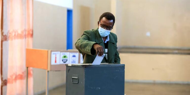 A man casts his vote in the general elections at Morwa village near Gaborone, Botswana October 30, 2024. REUTERS/Thalefang Charles