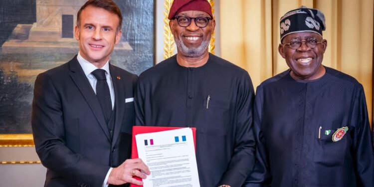 L-R: French President Emmanuel Macron; Minister of Solid Minerals Development, Dr. Dele Alake and President Bola Tinubu