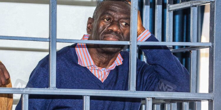 Kizza Besigye in caged dock during court appearance